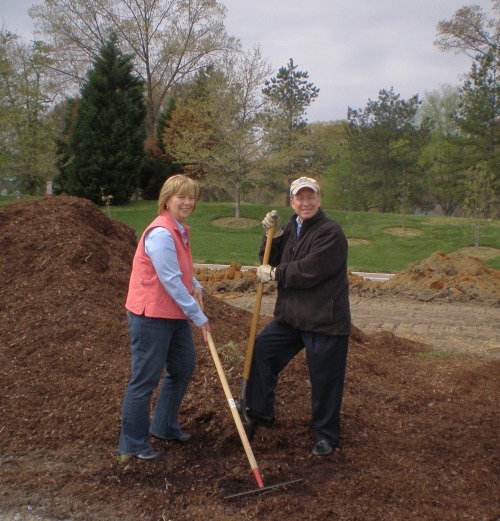 Feedmore President/CEO Fay Lohr (left) and Lewis Ginter Botanical Garden Executive Director Frank Robinson help break ground on the Community Kitchen Garden 
